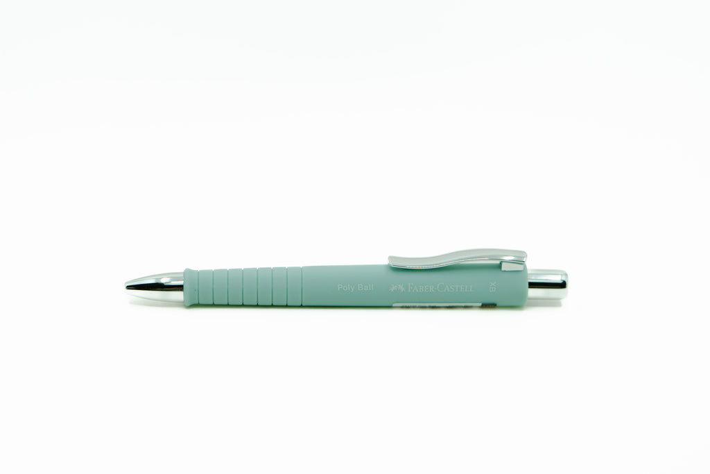 Light blue pen with a textured grip on a white background